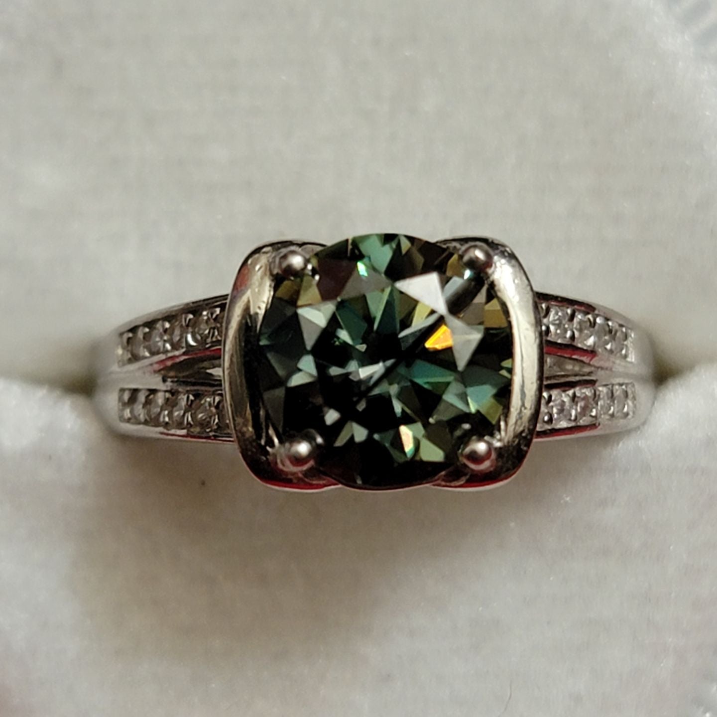 Radiant Green Splendor: Rhodium Plated Sterling Silver Ring with Moissanite Center - Size 6.5