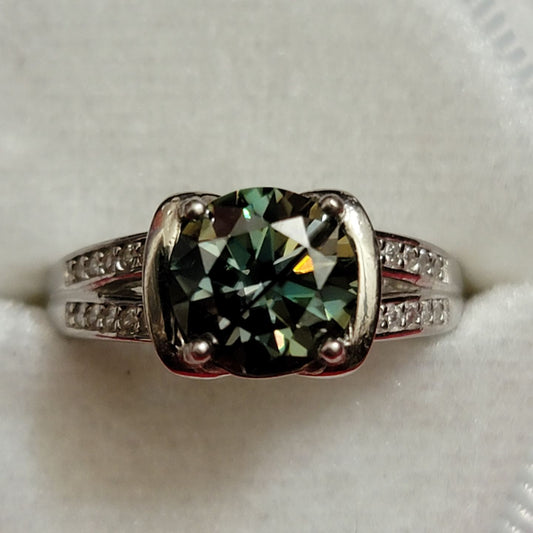 Radiant Green Splendor: Rhodium Plated Sterling Silver Ring with Moissanite Center - Size 6.5