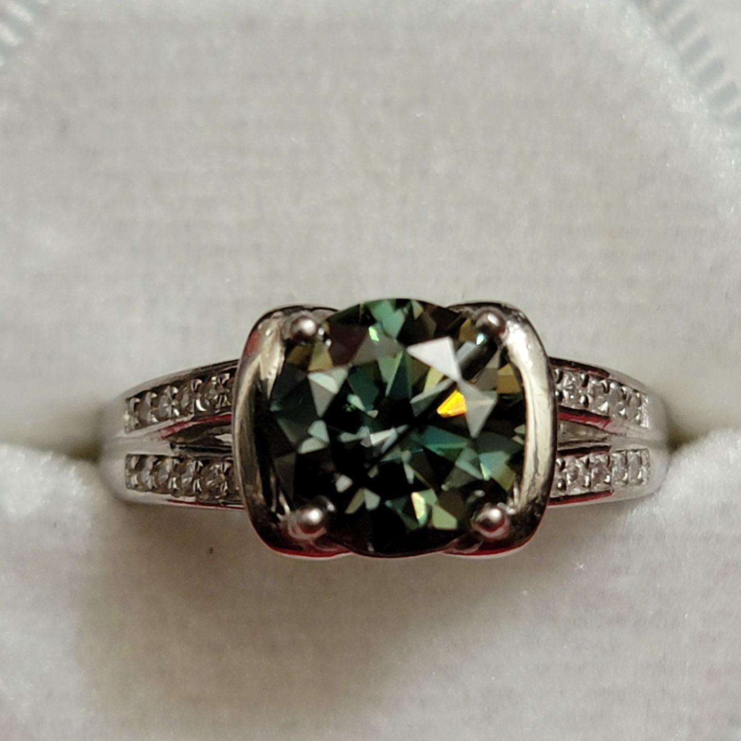 Radiant Green Splendor: Rhodium Plated Sterling Silver Ring with Moissanite Center - Size 6.5